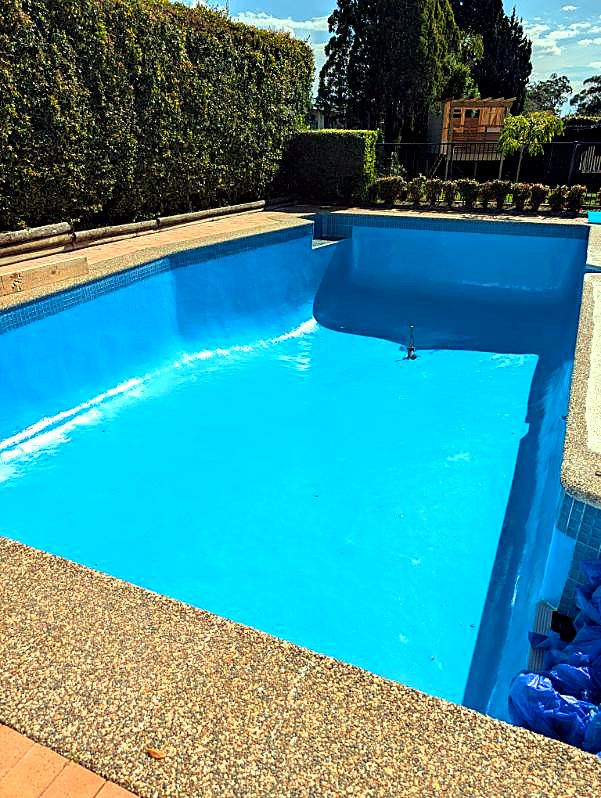 Same pool with a fresh bright blue epoxy finish